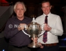 North Antrim Cultural Officer Jimmy Gaston presents the Antrim Senior Hurling Championship Cup to Dunloy captain James McKeague