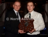 North Antrim Chairman Owen Elliott presents the North Antrim Senior Hurler of the Year award to Paul ‘Shorty’ Shiels of Dunloy Cuchullains