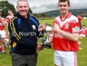 Paul McCaughan presents the James McCaughan Cup in memory of his late father to Loughgiel captain Conor Carey