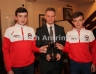 North Antrim Chairman Owen Elliott presents the Under 14 Division 1 League trophy to joint captains Fergal Donaghy and Liam McLaughlin of Eoghan Ruadh, Dungannon