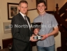 North Antrim GAA Chairman Owen Elliott pictured with Ryan Hill of McQuillan's  Ballycastle, winner of the Antrim County Féile Skills Final 2015